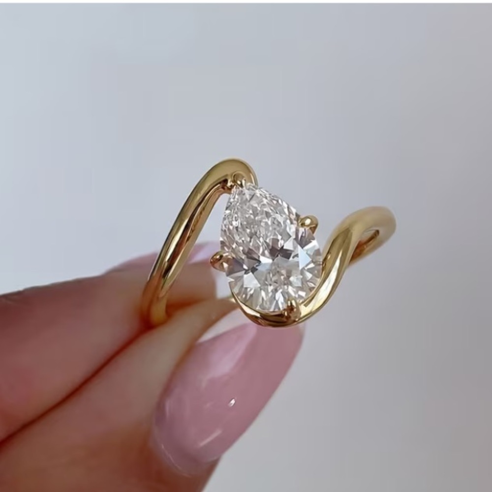Private Label 18k Gold Plated Swirl Ring with Pear-Cut White Topaz